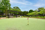 Thumbnail 19 of 29 - a putting green at the whispering winds apartments in pearland, tx  at Riverset Apartments, Memphis