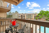 Thumbnail 17 of 29 - The view from the balcony  at Silver Reef Apartments in Lakewood, CO