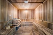 Thumbnail 22 of 35 - an empty finnish sauna with wooden walls and floors
