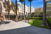 Thumbnail 2 of 15 - BBQ grill area at Carlton Court / Metro Hollywood Apartments Los Angeles, CA