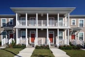 Thumbnail 11 of 15 - Two story exterior building-Harmony Oaks Apartments New Orleans LA