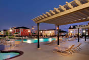 Thumbnail 10 of 15 - Outdoor pool area-Harmony Oaks Apartments New Orleans LA