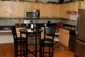 Thumbnail 4 of 16 - Furnished kitchen area-Quimby Plaza Apartments Memphis, TN