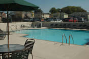 Thumbnail 13 of 16 - Outdoor pool and pool area-Quimby Plaza Apartments Memphis, TN