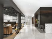 Thumbnail 3 of 19 - Lobby with marble flooring, conversational seating and dark finishes  at Clayton On The Park, Missouri, 63105