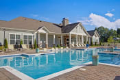 Thumbnail 25 of 37 - Swimming pool and pool deck at York Woods at Lake Murray Apartment Homes, Columbia, South Carolina