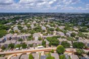 Thumbnail 20 of 52 - an aerial view of a neighborhood with houses and trees