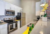 Thumbnail 1 of 33 - Biltmore at Midtown apartments in Atlanta, GA photo of kitchen
