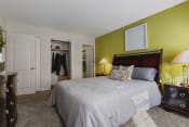 Thumbnail 4 of 16 - a bedroom with green walls and a large bed at Kenilworth at Charles, Towson MD