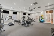 Thumbnail 33 of 41 - fitness center with exercise equipment at Fortress Grove, Tennessee