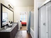 Thumbnail 5 of 18 - Designer Bathroom Suites at The Edison Lofts Apartments, Raleigh, North Carolina