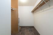 Thumbnail 5 of 5 - Bismarck, ND Bradbury Apartment. A small laundry room with a washer and dryer