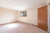 Thumbnail 6 of 6 - Bedroom at Parkview Arms Apartments in Bismarck, ND