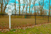 Thumbnail 50 of 79 - a dog park sign on the side of a fence at Willowbrooke Apartments, Brockport, NY