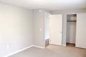 Thumbnail 20 of 79 - an empty room with a closet and a door to a bathroom at Willowbrooke Apartments, Brockport, 14420