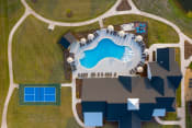 Thumbnail 4 of 17 - arial view of an outdoor swimming pool with umbrellas and a house  at The Edison at Madison, Alabama, 35757
