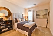Thumbnail 10 of 23 - a bedroom with a large bed and a window  at Aventura at Mid Rivers, St. Charles, Missouri