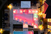 Thumbnail 18 of 18 - a birdseye view of a building with a neon sign on it  at The Edison at Tiffany Springs, Kansas City, Missouri