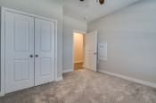 Thumbnail 36 of 65 - Bedroom with Closet Space (Luxury Floor Plan) at Emerald Creek Apartments, Greenville
