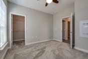 Thumbnail 39 of 65 - Bedroom with Walk-In Closet (Premier Floor Plan) at Emerald Creek Apartments, Greenville
