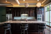 Thumbnail 6 of 22 - Kitchen in the club room at the Residences of Creekside.
