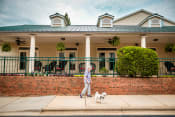 Thumbnail 15 of 59 - Woman Walking Dog at The Dorchester & Manor, Pineville, NC, 28134