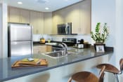 Thumbnail 12 of 36 - Kitchen with stainless steel appliances