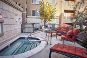 Thumbnail 13 of 48 - San Jose, CA Apartments for Rent - Aviara - Spa Surrounded by Lounge Seating