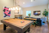 Thumbnail 6 of 57 - Issaquah WA Apartments - Lakemont Orchard - Game Room with a Billiards Table