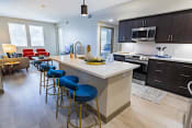 Thumbnail 75 of 83 - furnished kitchen with stool seating