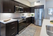 Thumbnail 73 of 83 - furnished kitchen with stainless steel appliances