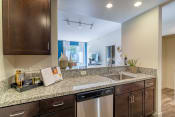 Thumbnail 8 of 55 - redesigned kitchen with granite counter tops and stainless steel appliances and a window