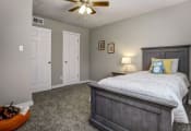 Thumbnail 11 of 18 - Image of second bedroom with plush carpet and ceiling fan