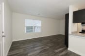 Thumbnail 18 of 55 - a bedroom with a large window and hardwood floors at Bennett Ridge Apartments, Oklahoma City, OK