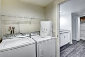 Thumbnail 31 of 43 - 12 Central Square Laundry Room with Washer and Dryer and Laundry Basket