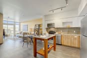 Thumbnail 1 of 30 - Sparc Apartments Model Kitchen and Dining Area
