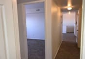 Thumbnail 8 of 11 - Columbine West Apartments Bedroom and Hallway