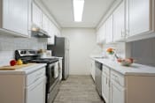 Thumbnail 3 of 39 - Novela Apartments Full Kitchen view