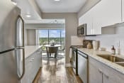 Thumbnail 9 of 66 - Spacious kitchen with large island and beautiful view at CityView on Meridian, Indiana, 46208