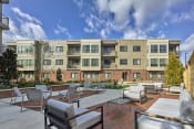 Thumbnail 1 of 12 - Lansdale Station Apartments outdoor fire pit and seating area