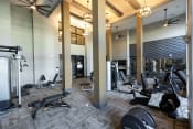 Thumbnail 5 of 19 - The Juncture Apartments fitness center with cardio equipment