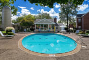 Thumbnail 6 of 18 - East Chase Apartments swimming pool