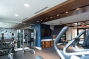 Thumbnail 8 of 20 - The Airdrie at Paoli Station fitness center with free weights