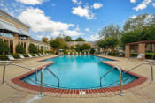 Thumbnail 10 of 21 - The Vineyards resort-style pool and surrounding sundeck