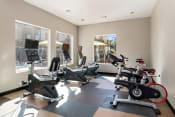Thumbnail 11 of 26 - First and Main Apartments fitness center bikes and spin bikes