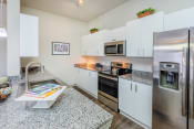 Thumbnail 19 of 26 - Centre Pointe Apartments stainless steel appliances