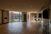 Thumbnail 45 of 75 - empty studio space with large windows and hardwood floors at The Apex at CityPlace, Overland Park, KS, 66210