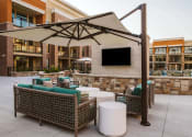 Thumbnail 3 of 75 - couches under a canapoy at an apartment complex outdoor pool at The Apex at CityPlace, Overland Park, KS, 66210