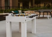 Thumbnail 4 of 75 - a foosball table on an outdoor patio at The Apex at CityPlace, Kansas