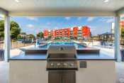 Thumbnail 10 of 36 - the preserve at ballantyne commons clubhouse with a gas grill and pool